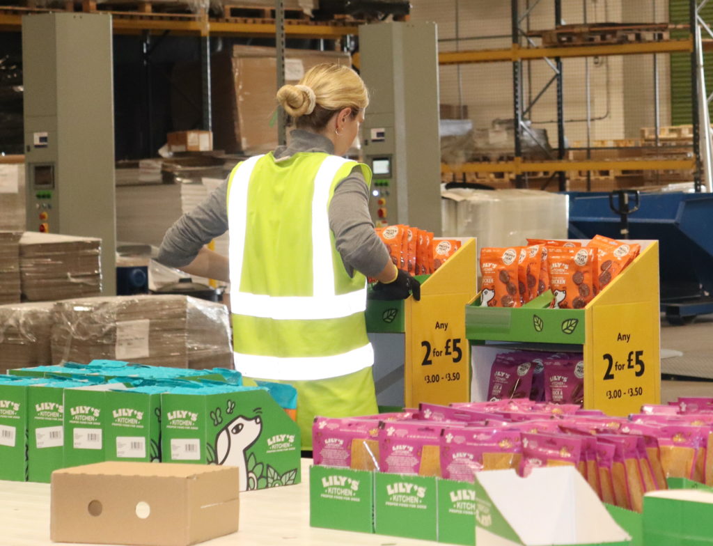 Easypack Co-packing team packing Lily's Kitchen mixed product into an FSDU
